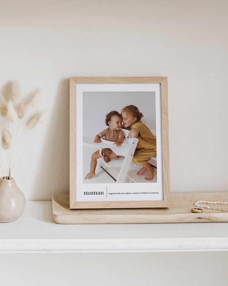 Affiche déco personnalisée d'une photo d'un enfant et, en-dessous, un message "maman".